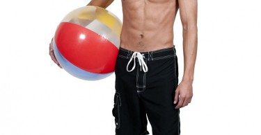 bigstock-Man-Holding-Beachball-35913907