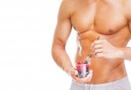 _web-bigstock-fit-man-holding-a-bowl-of-fres-133357376